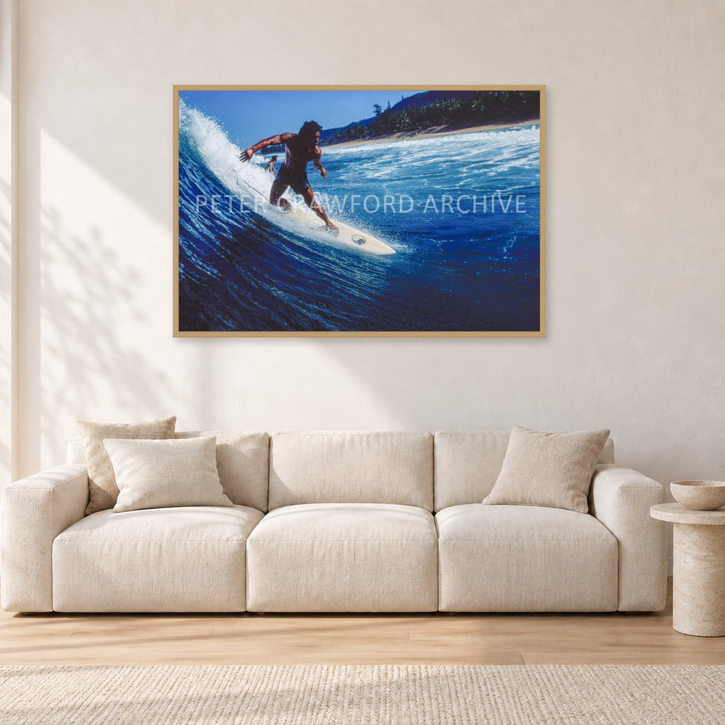 Dane Kealoha, Off The Wall 1978 by Peter Crawford — 120 × 80 cm, hayseed frame, shown in a light minimalist living room.