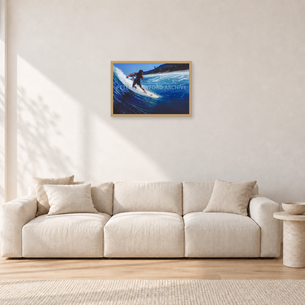 Dane Kealoha, Off The Wall 1978 by Peter Crawford — 60 × 40 cm, hayseed frame, shown in a light minimalist living room.