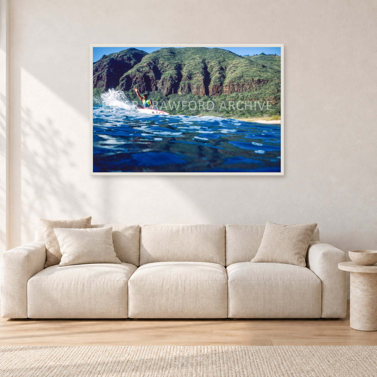 Dane Kealoha, West Side Oahu by Peter Crawford — 120 × 80 cm, white frame, shown in a light minimalist living room.