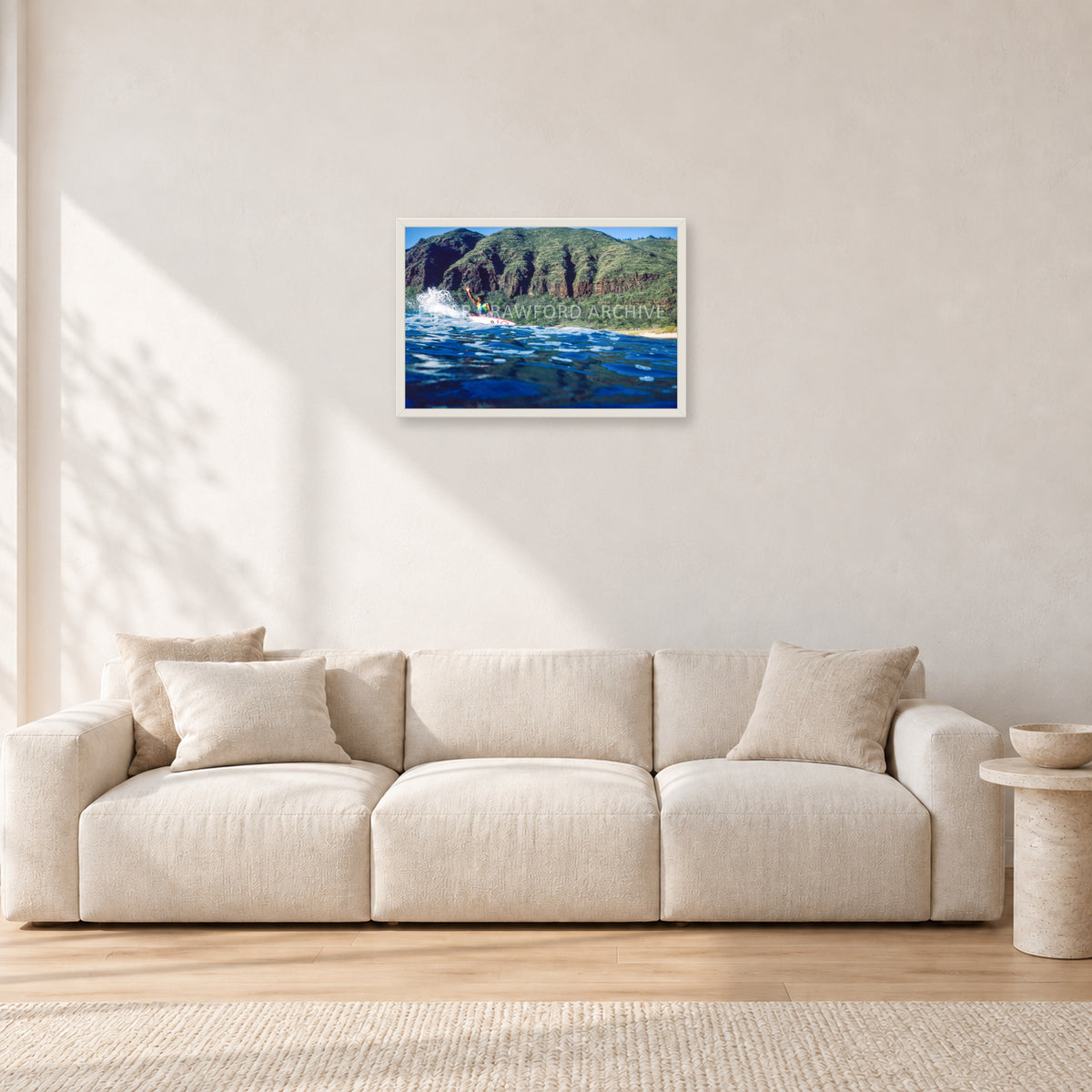 Dane Kealoha, West Side Oahu by Peter Crawford — 60 × 40 cm, white frame, shown in a light minimalist living room.