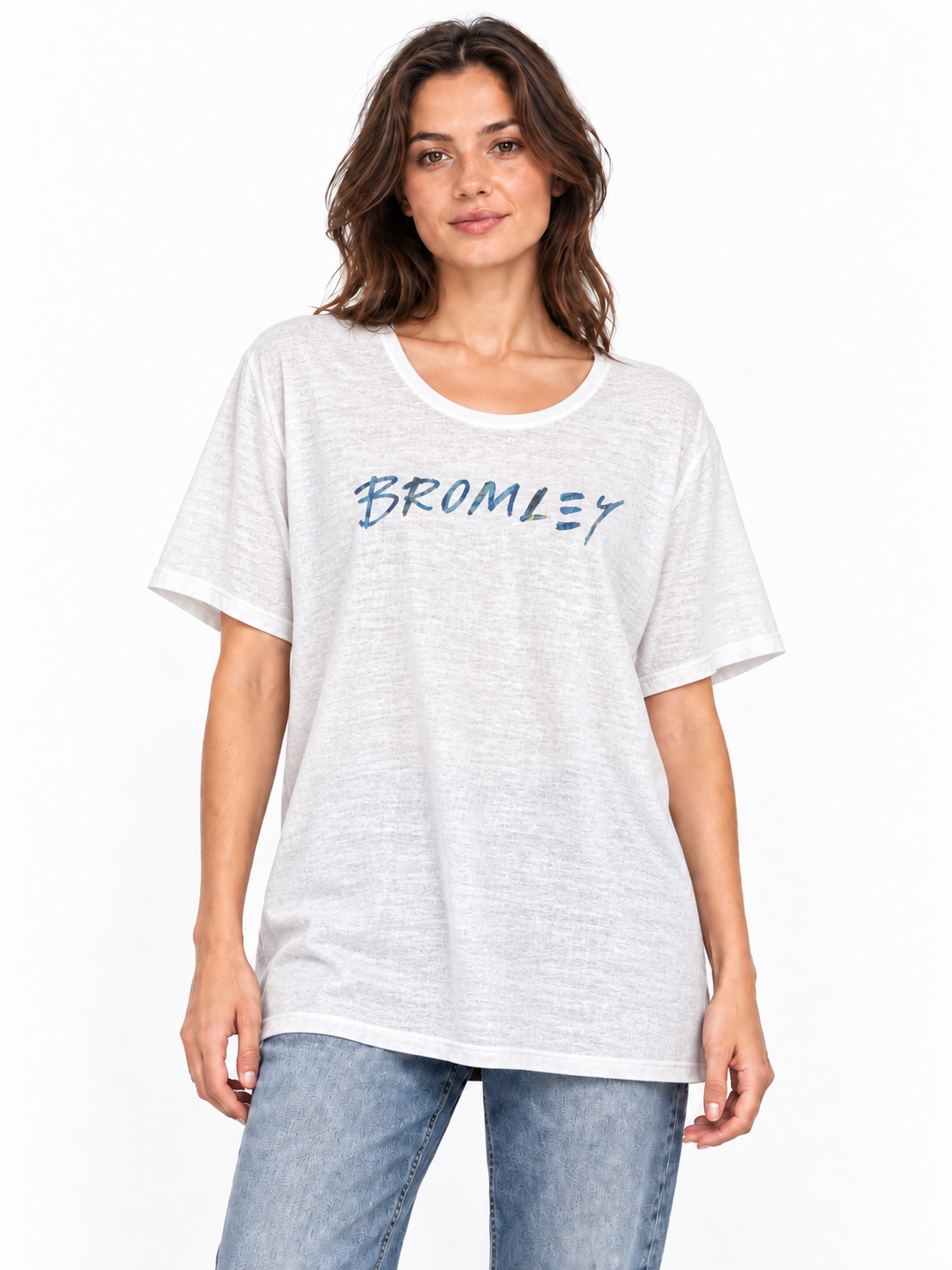 David Bromley Signature White white 100% linen T-shirt worn by a model with blue jeans