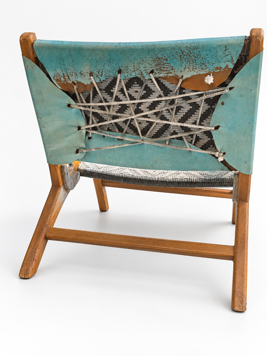 David Bromley Bird Chair rear view showing cord lacing, woven backing and original surface wear