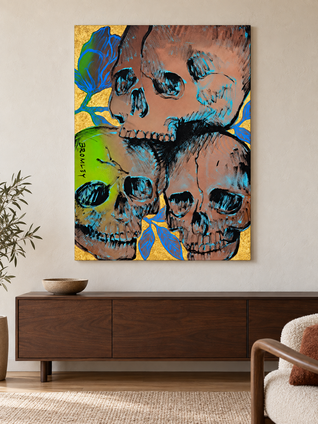 Interior mockup showing David Bromley - Gold Skull, 91 × 121 cm, in a contemporary room