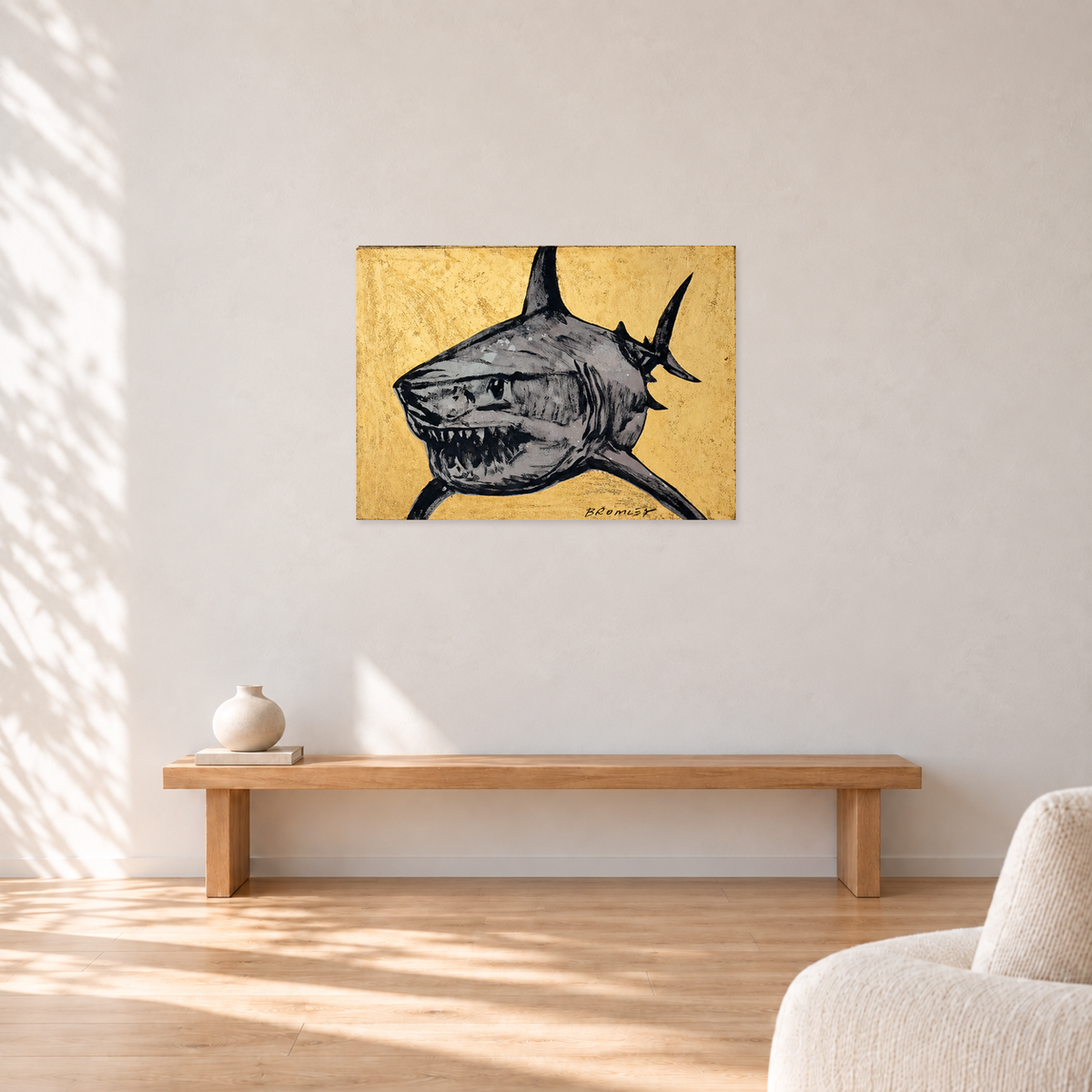 David Bromley - GOLDEN SHARK, 90 cm wide by 65 cm high, displayed to scale above an oak bench in a neutral room