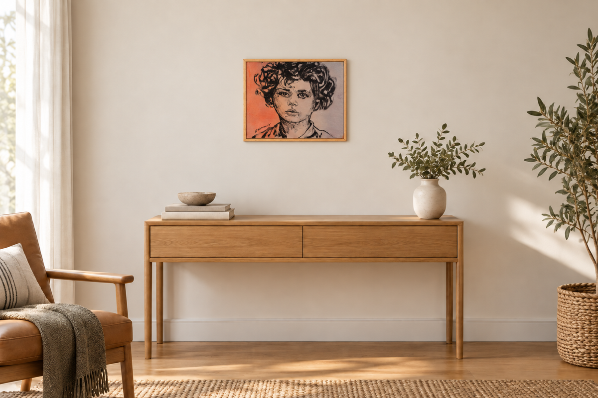David Bromley Portrait Boy, 56 × 49 cm, shown at a smaller scale above an oak console in a neutral room.
