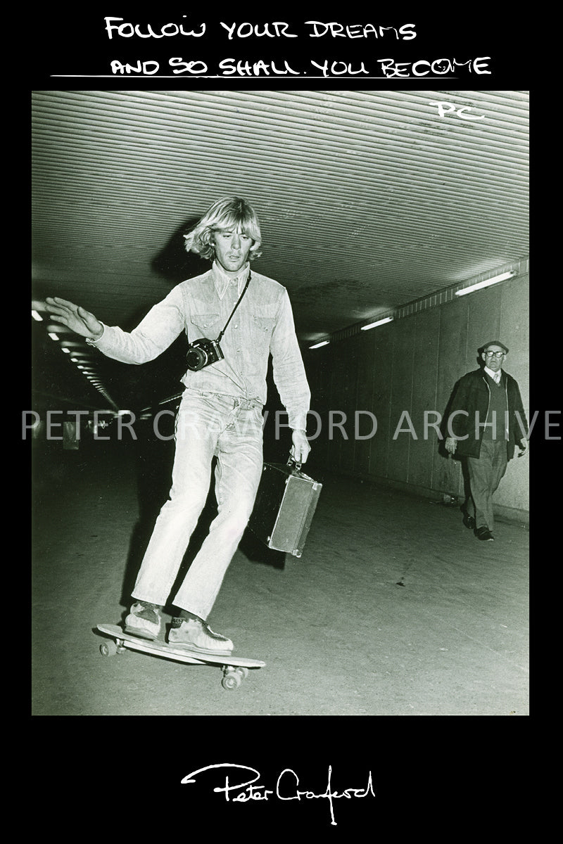 Peter Crawford carries his portfolio through The Domain tunnels in Sydney. Peter Crawford Archive.