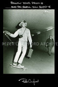 Peter Crawford carries his portfolio through The Domain tunnels in Sydney. Peter Crawford Archive.