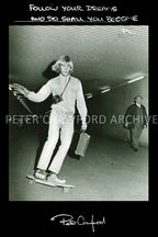 Peter Crawford carries his portfolio through The Domain tunnels in Sydney. Peter Crawford Archive.