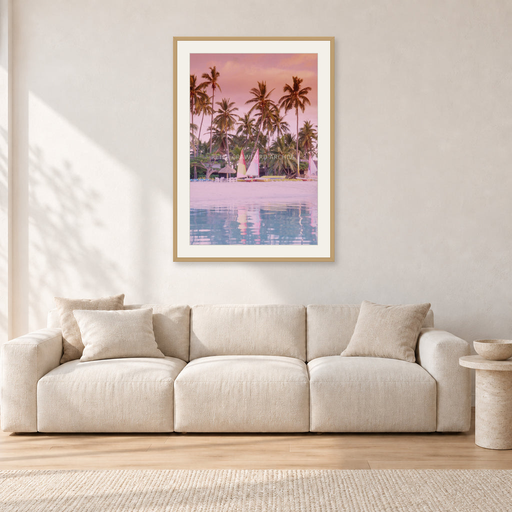 Fiji, Peter Crawford by Peter Crawford — 60 × 90 cm, hayseed frame with white mat, shown in a light minimalist living room.