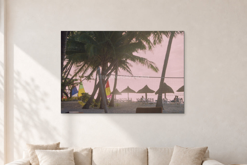 Fiji Sunset I by Peter Crawford — 120 × 80 cm, aluminium-mounted resin print, shown in a light minimalist living room.