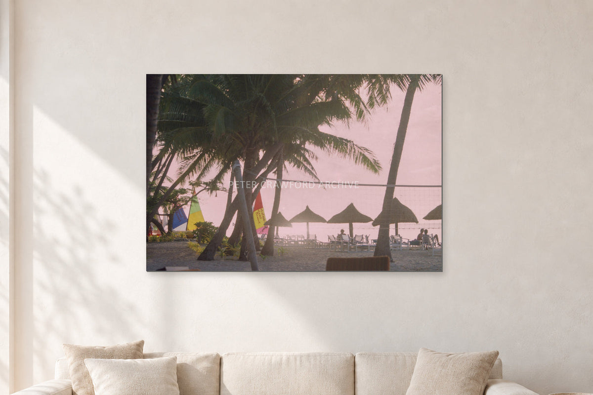 Fiji Sunset I by Peter Crawford — 120 × 80 cm, aluminium-mounted resin print, shown in a light minimalist living room.