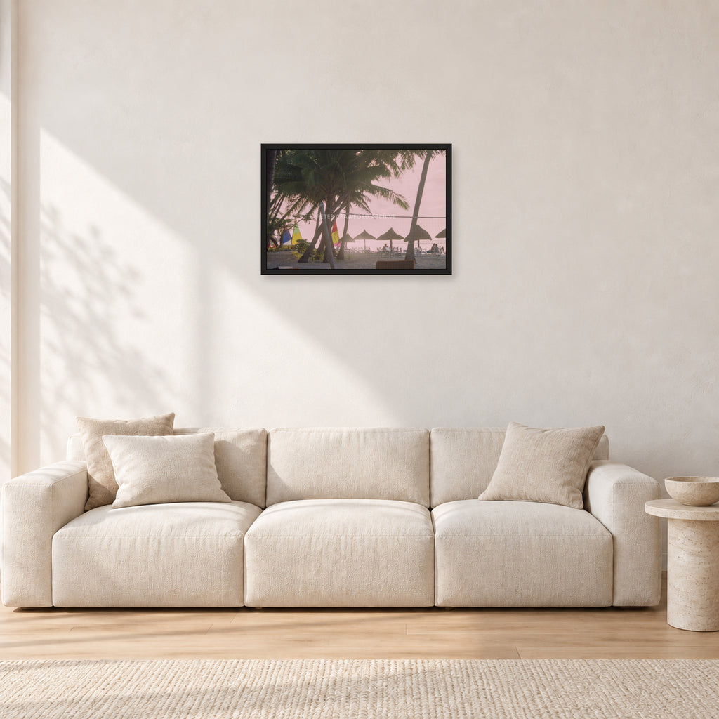Fiji Sunset I by Peter Crawford — 60 × 40 cm, black frame, shown in a light minimalist living room.