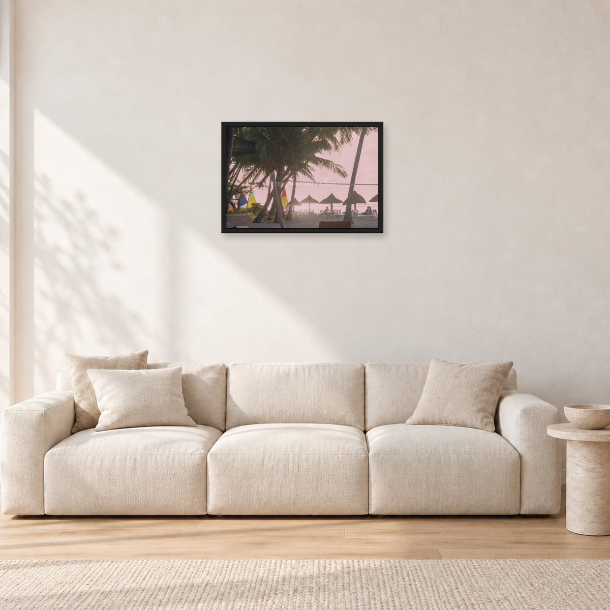 Fiji Sunset I by Peter Crawford — 60 × 40 cm, black frame, shown in a light minimalist living room.