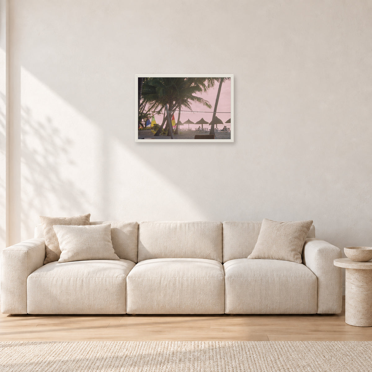 Fiji Sunset I by Peter Crawford — 60 × 40 cm, white frame, shown in a light minimalist living room.