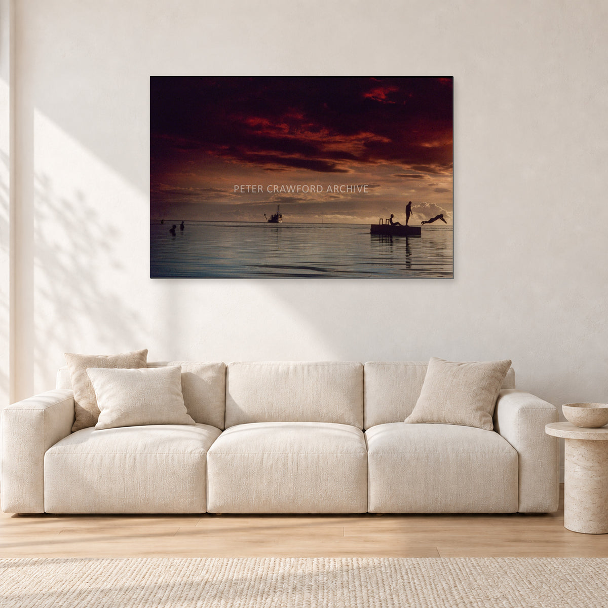 Fiji Sunset II by Peter Crawford — 120 × 80 cm, aluminium-mounted resin print, shown in a light minimalist living room.