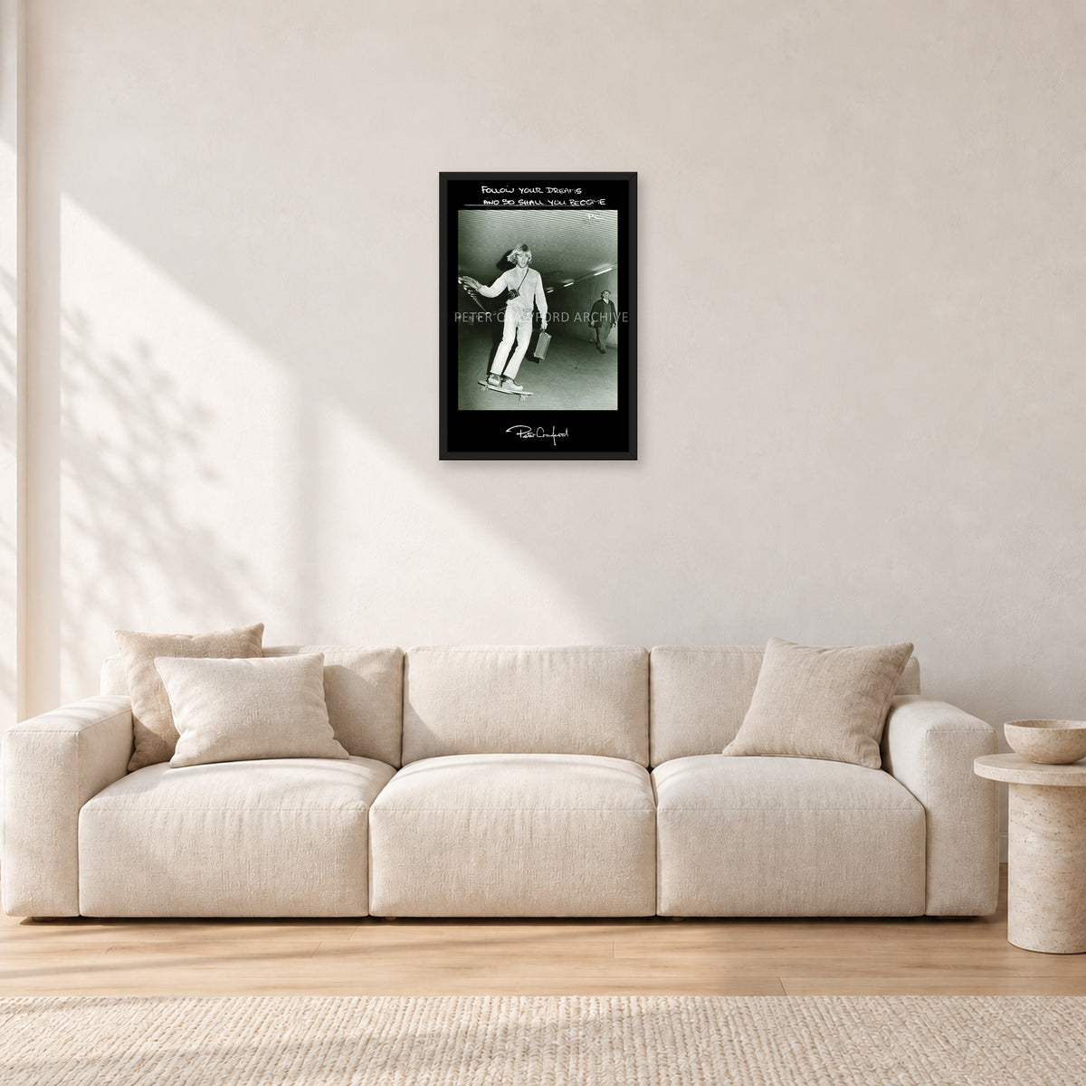 Follow Your Dreams by Peter Crawford — 40 × 60 cm, black frame, shown in a light minimalist living room.