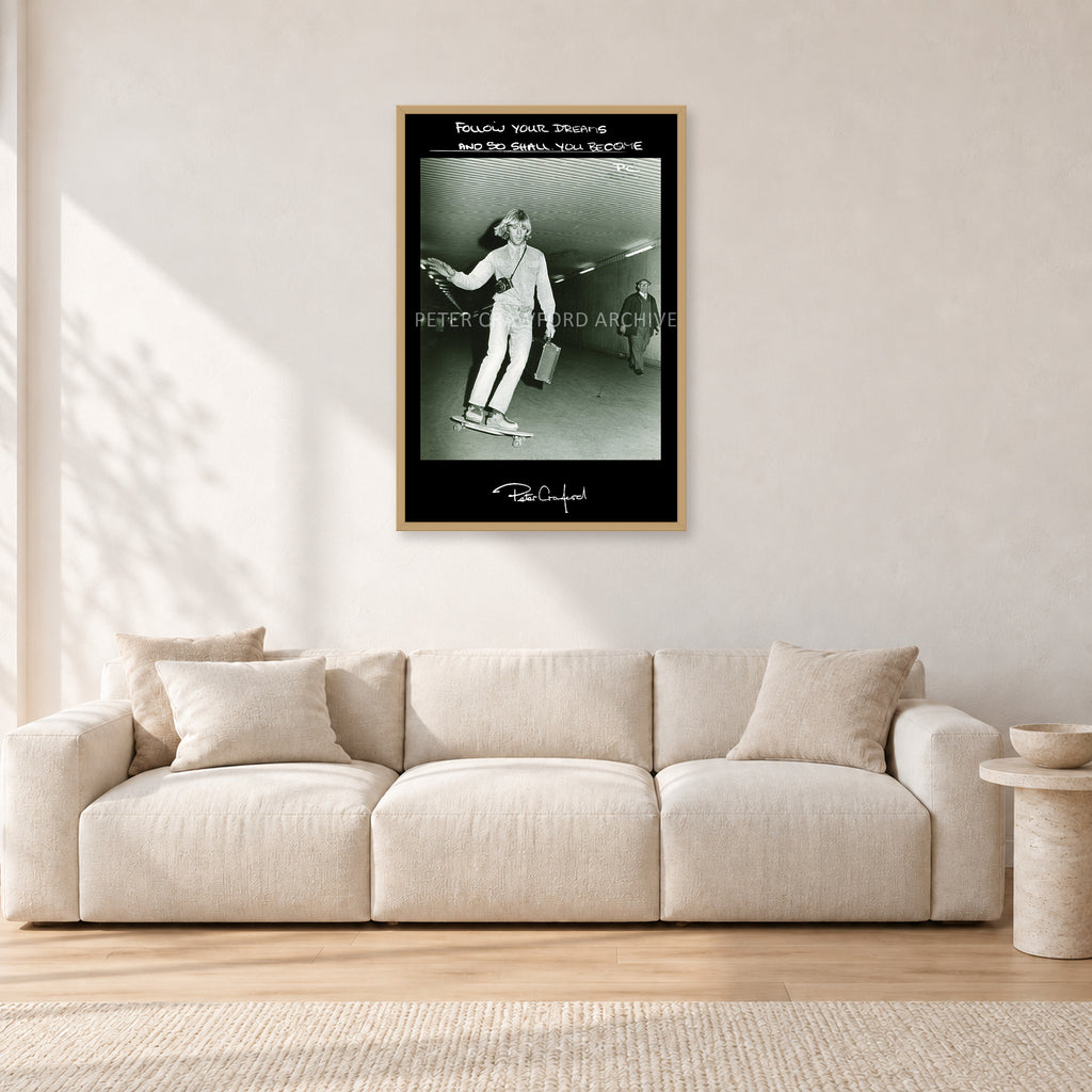 Follow Your Dreams by Peter Crawford — 60 × 90 cm, hayseed frame, shown in a light minimalist living room.