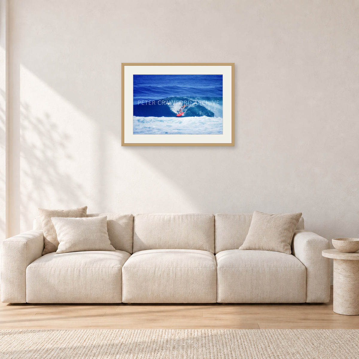 Hawaii Surf Study 20 by Peter Crawford — 60 × 40 cm, hayseed frame with white mat, shown in a light minimalist living room.
