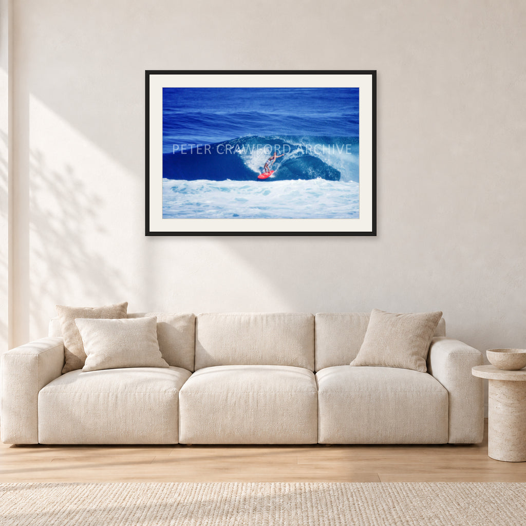 Hawaii Surf Study 20 by Peter Crawford — 90 × 60 cm, black frame with white mat, shown in a light minimalist living room.