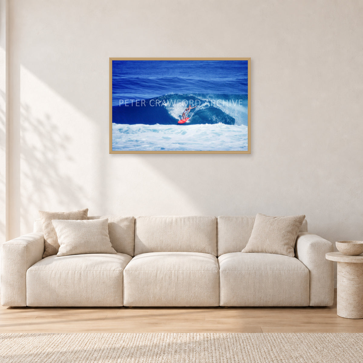 Hawaii Surf Study 20 by Peter Crawford — 90 × 60 cm, hayseed frame, shown in a light minimalist living room.