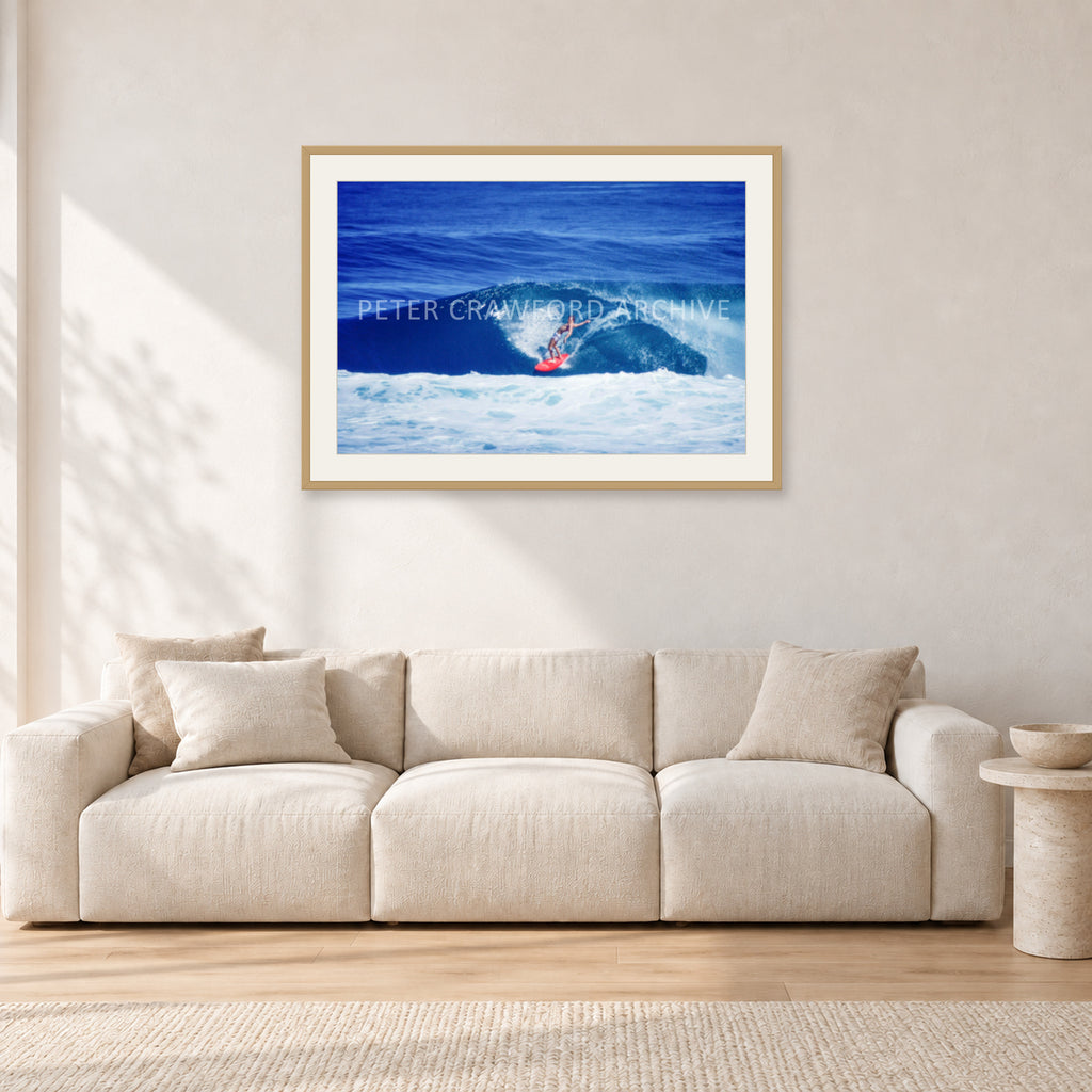 Hawaii Surf Study 20 by Peter Crawford — 90 × 60 cm, hayseed frame with white mat, shown in a light minimalist living room.