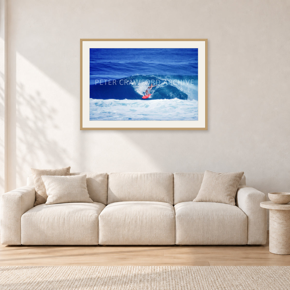 Hawaii Surf Study 20 by Peter Crawford — 90 × 60 cm, hayseed frame with white mat, shown in a light minimalist living room.