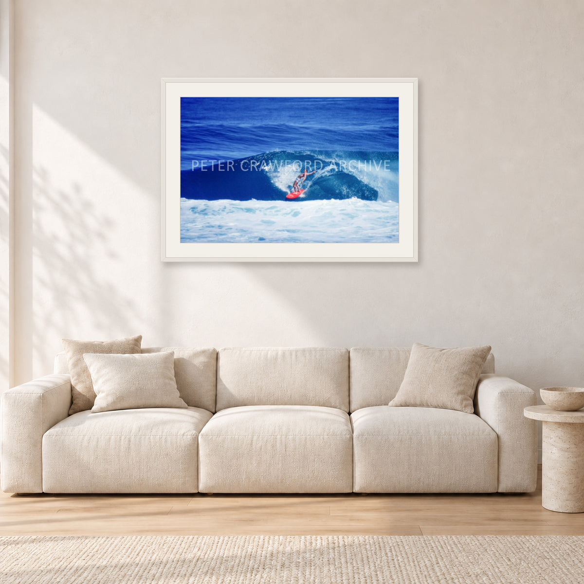 Hawaii Surf Study 20 by Peter Crawford — 90 × 60 cm, white frame with white mat, shown in a light minimalist living room.