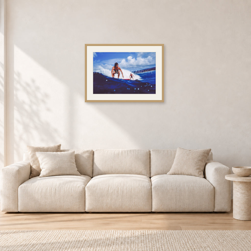 Hawaii Surf Study 24 by Peter Crawford — 60 × 40 cm, hayseed frame with white mat, shown in a light minimalist living room.