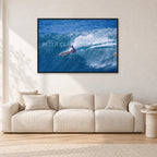 Honolua Bay, No Leash by Peter Crawford — 120 × 80 cm, black frame, shown in a light minimalist living room.