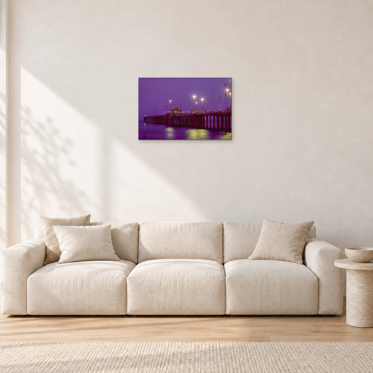 Huntington Pier by Peter Crawford — 60 × 40 cm, aluminium-mounted resin print, shown in a light minimalist living room.