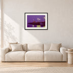 Huntington Pier by Peter Crawford — 60 × 40 cm, black frame with white mat, shown in a light minimalist living room.