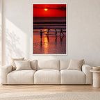Indonesian Sunset Kids by Peter Crawford — 80 × 120 cm, white frame, shown in a light minimalist living room.