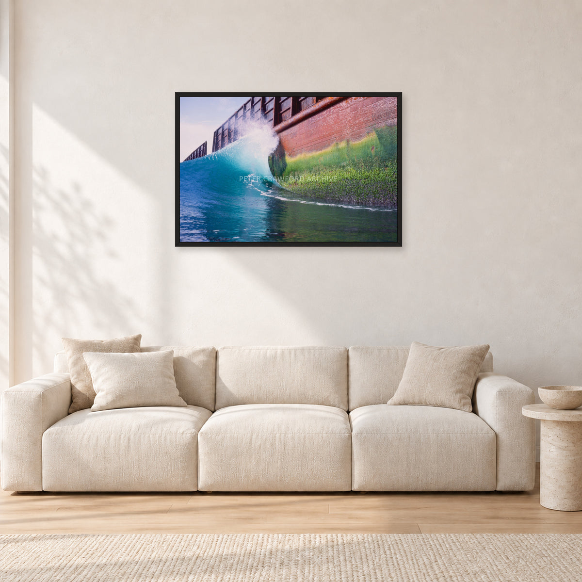 Indonesian Wreck, 1999 by Peter Crawford — 90 × 60 cm, black frame, shown in a light minimalist living room.