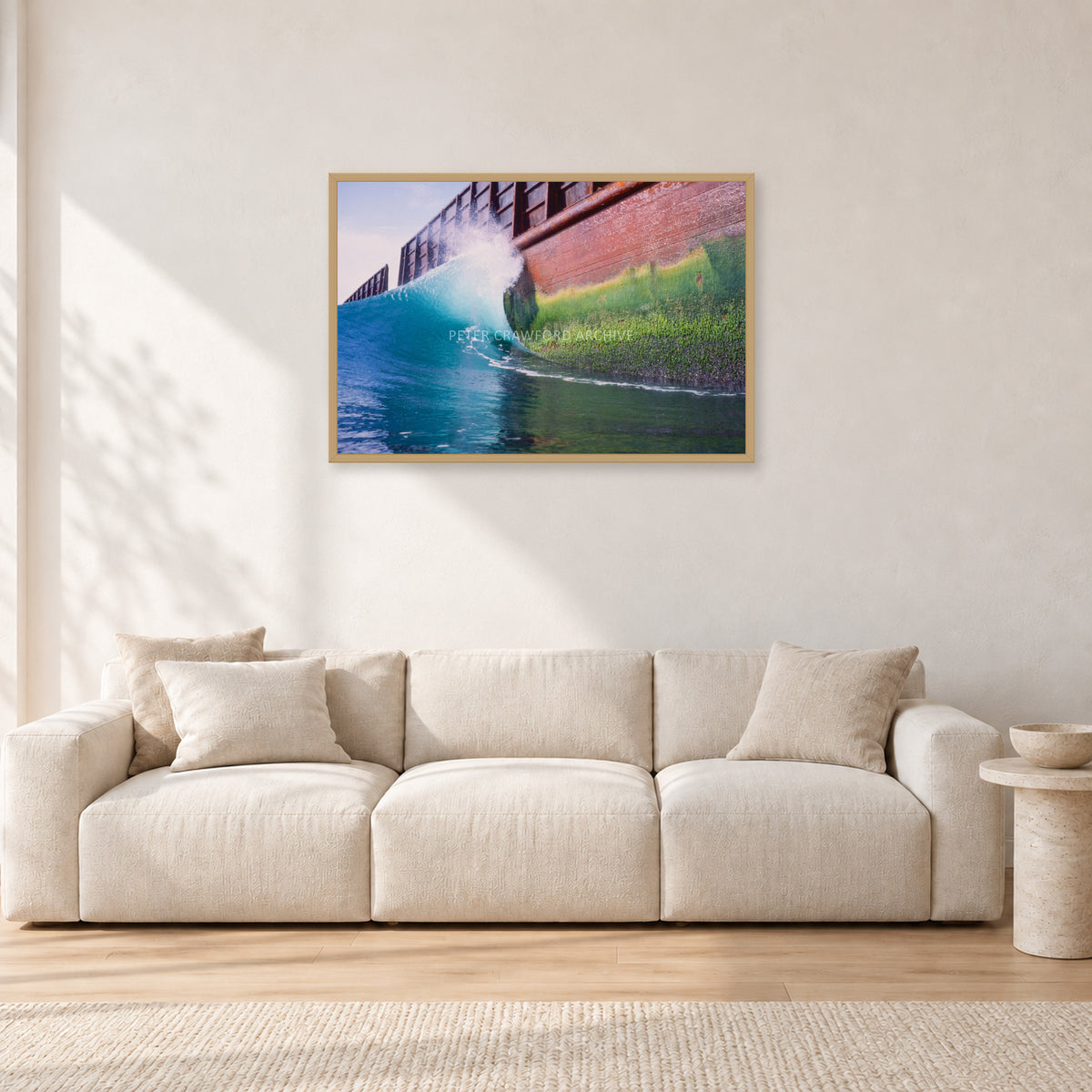 Indonesian Wreck, 1999 by Peter Crawford — 90 × 60 cm, hayseed frame, shown in a light minimalist living room.