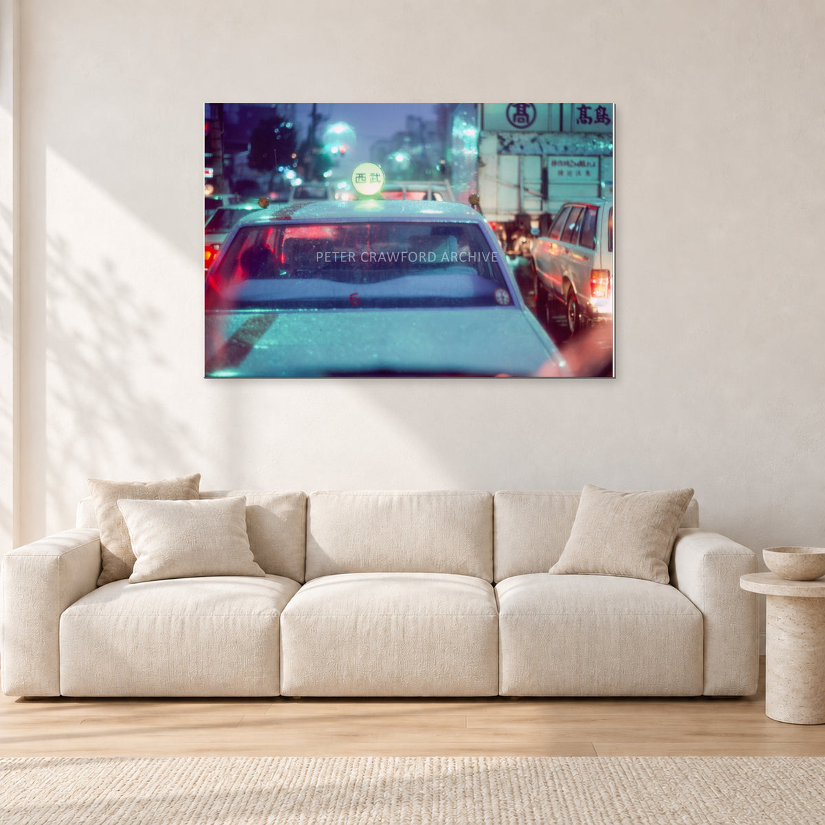 Japan City Lights by Peter Crawford — 120 × 80 cm, aluminium-mounted resin print, shown in a light minimalist living room.