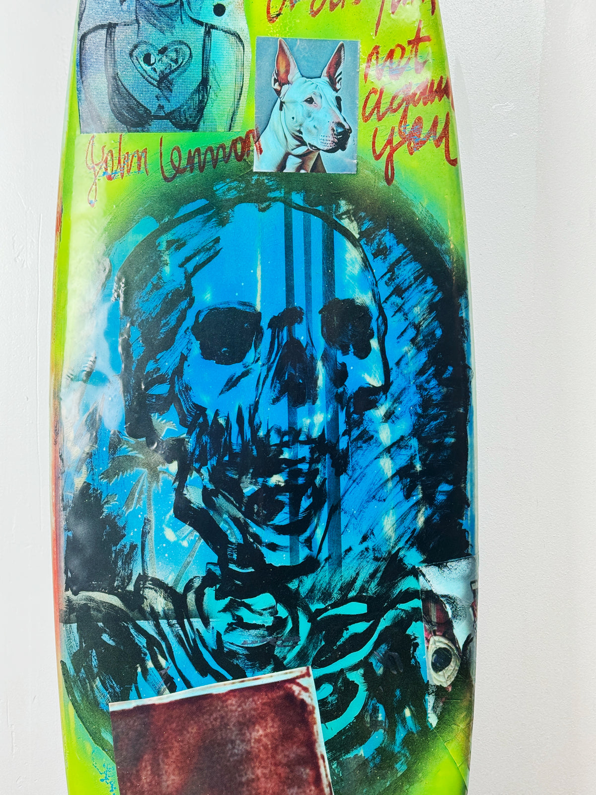 Blue Skulls Surfboard by David Bromley — central blue skull detail.