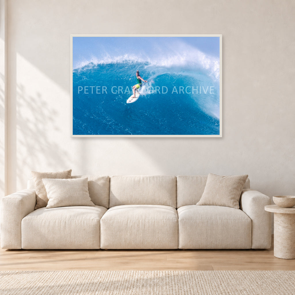 Kong, Sunset Beach 1980s by Peter Crawford — 120 × 80 cm, white frame, shown in a light minimalist living room.