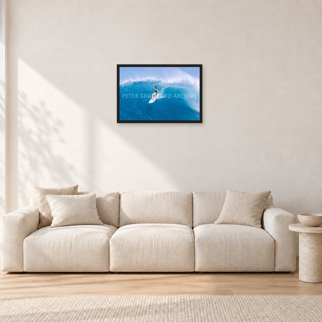 Kong, Sunset Beach 1980s by Peter Crawford — 60 × 40 cm, black frame, shown in a light minimalist living room.