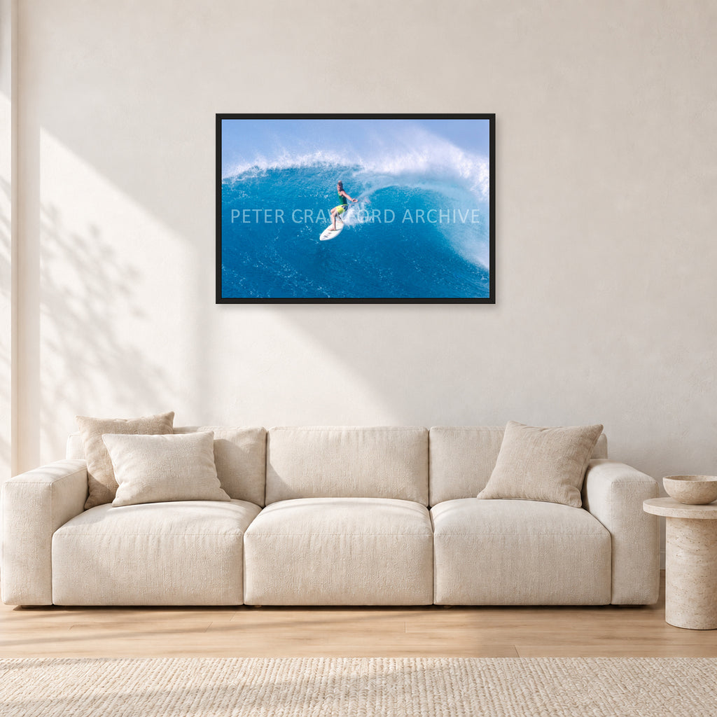 Kong, Sunset Beach 1980s by Peter Crawford — 90 × 60 cm, black frame, shown in a light minimalist living room.