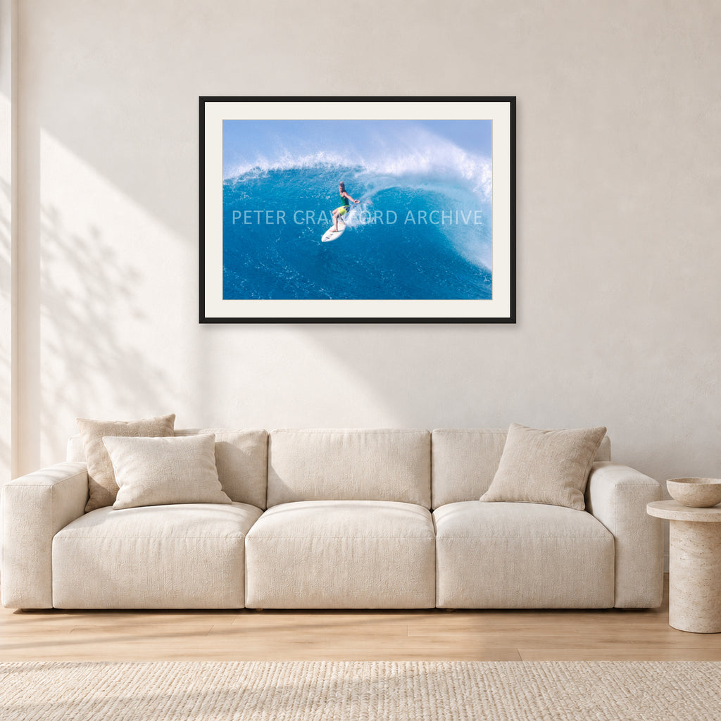 Kong, Sunset Beach 1980s by Peter Crawford — 90 × 60 cm, black frame with white mat, shown in a light minimalist living room.