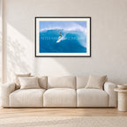 Kong, Sunset Beach 1980s by Peter Crawford — 90 × 60 cm, black frame with white mat, shown in a light minimalist living room.