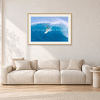 Kong, Sunset Beach 1980s by Peter Crawford — 90 × 60 cm, hayseed frame with white mat, shown in a light minimalist living room.