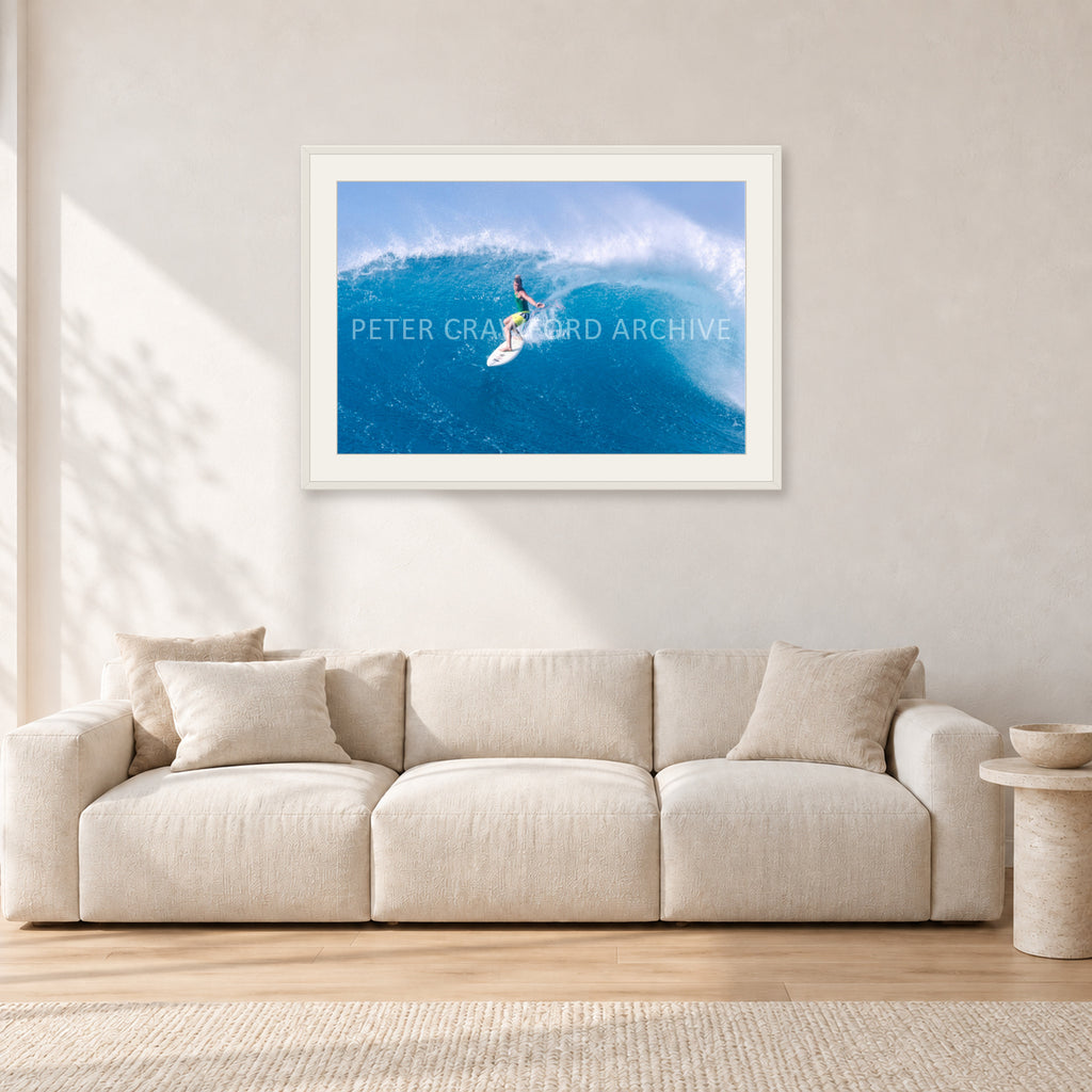 Kong, Sunset Beach 1980s by Peter Crawford — 90 × 60 cm, white frame with white mat, shown in a light minimalist living room.