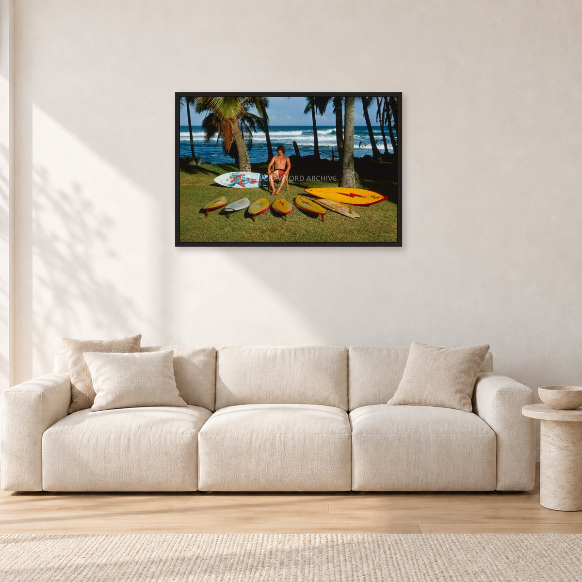 Mark Richards Hawaiian Quiver, North Shore 1976 by Peter Crawford — 90 × 60 cm, black frame, shown in a light minimalist living room.