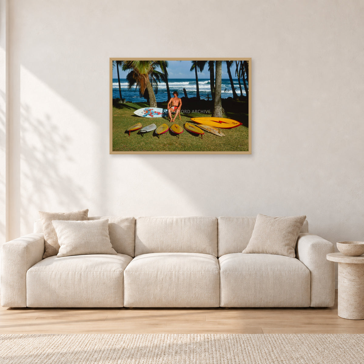 Mark Richards Hawaiian Quiver, North Shore 1976 by Peter Crawford — 90 × 60 cm, hayseed frame, shown in a light minimalist living room.