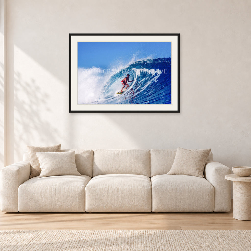 Marvin Foster, Pipeline 1987 by Peter Crawford — 90 × 60 cm, black frame with white mat, shown in a light minimalist living room.