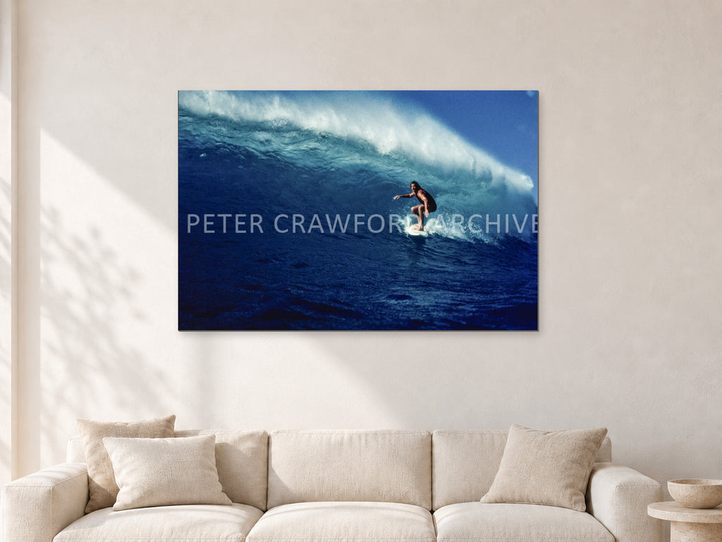 Michael Peterson, Sunset Beach 1975 by Peter Crawford — 120 × 80 cm, aluminium-mounted resin print, shown in a light minimalist living room.