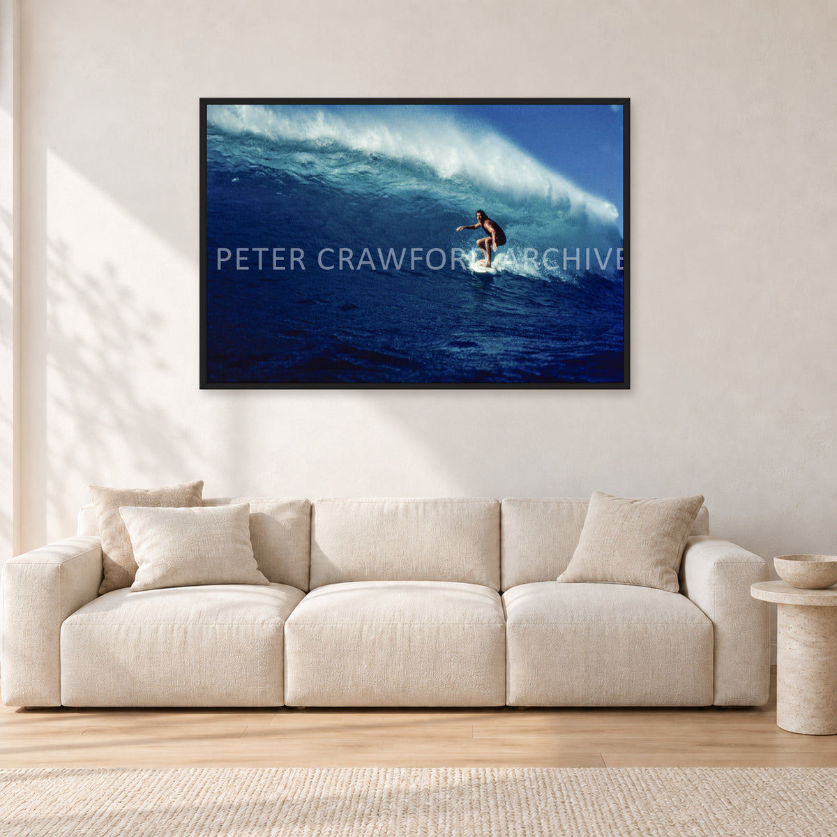 Michael Peterson, Sunset Beach 1975 by Peter Crawford — 120 × 80 cm, black frame, shown in a light minimalist living room.