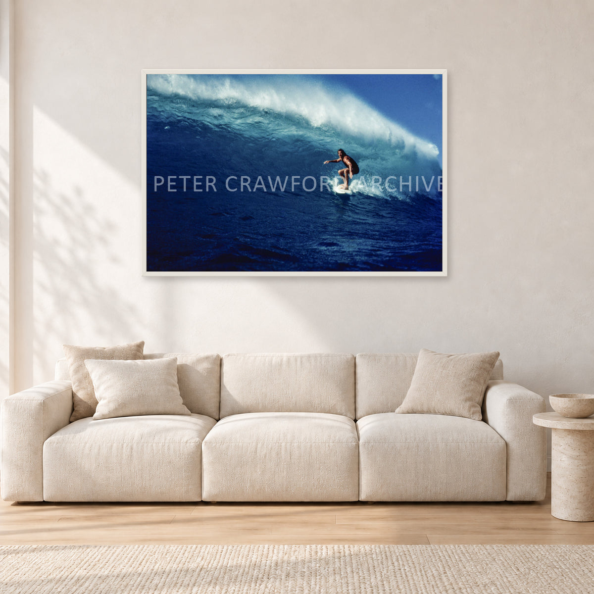 Michael Peterson, Sunset Beach 1975 by Peter Crawford — 120 × 80 cm, white frame, shown in a light minimalist living room.
