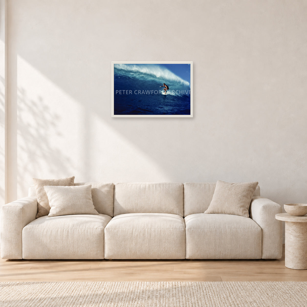 Michael Peterson, Sunset Beach 1975 by Peter Crawford — 60 × 40 cm, white frame, shown in a light minimalist living room.